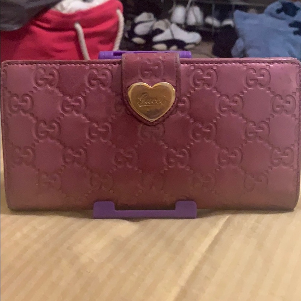 shiny colored pink Gucci wallet